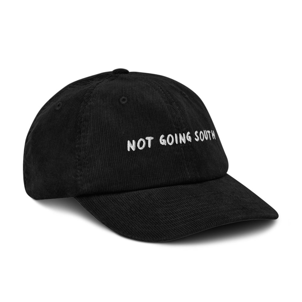 Not Going South corduroy cap in Black, angled view, white embroidery, Islington Vibes