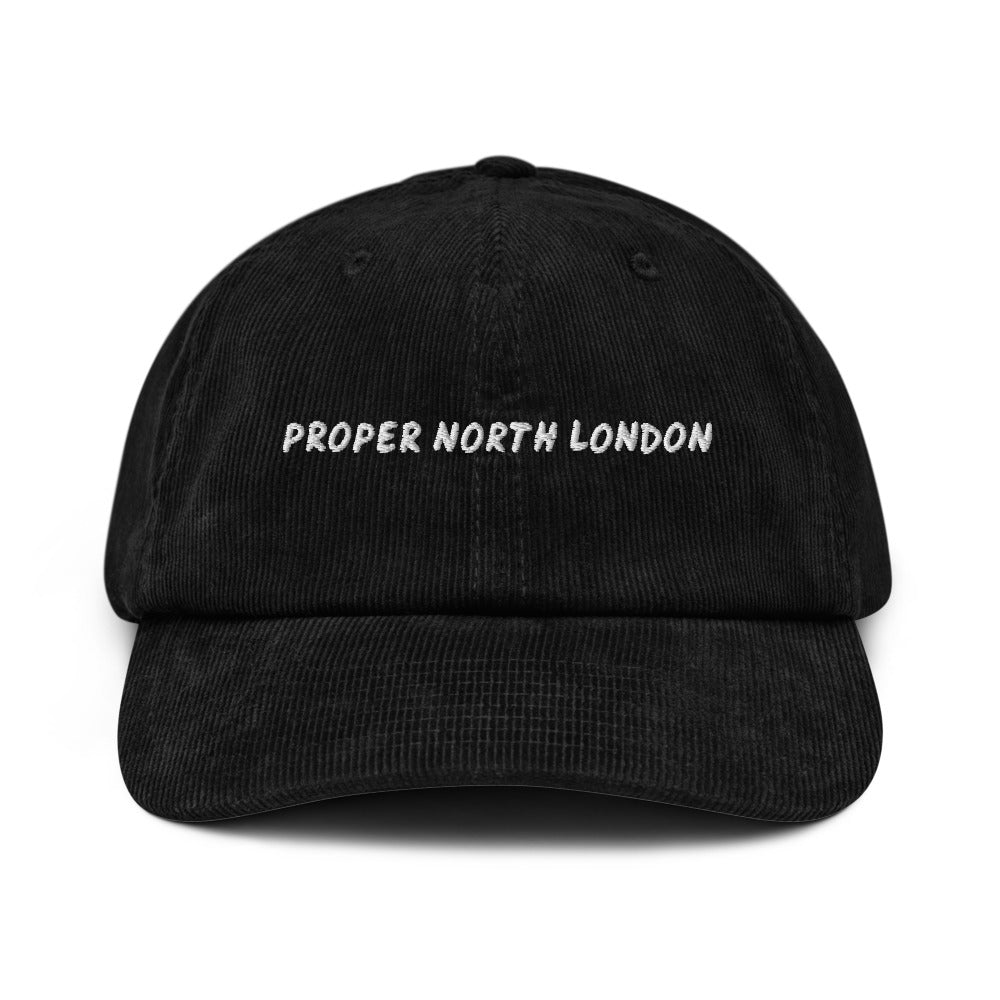 Proper North London corduroy cap in Black, front view, white embroidery, Islington Vibes